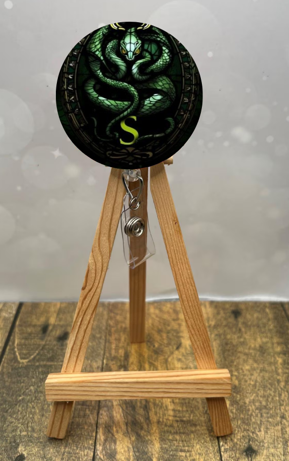 Snake House Pride badge pulls. Multiple Images available. Add beads or shimmer glitter options.