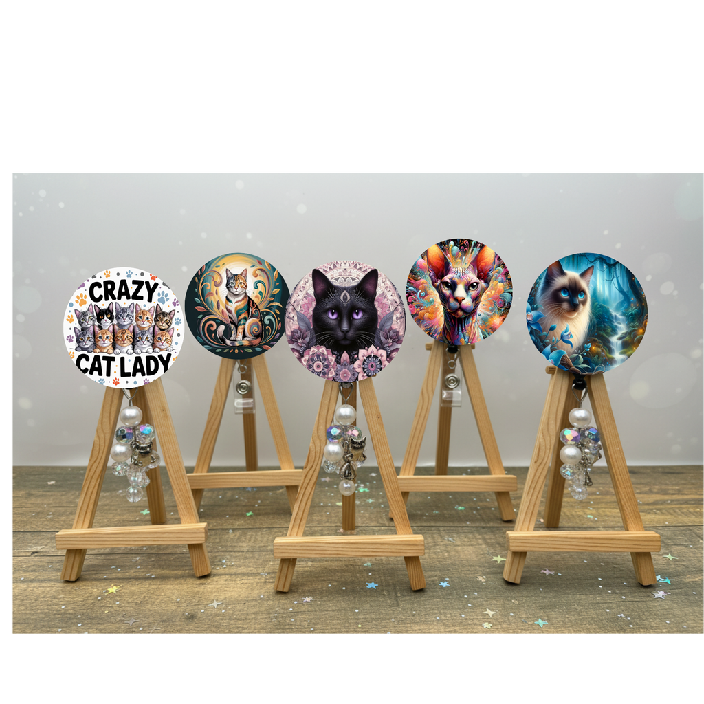 Cat badge pulls. Make every shift a purr‑fect one. Multiple Images available. Add beads or shimmer glitter options.