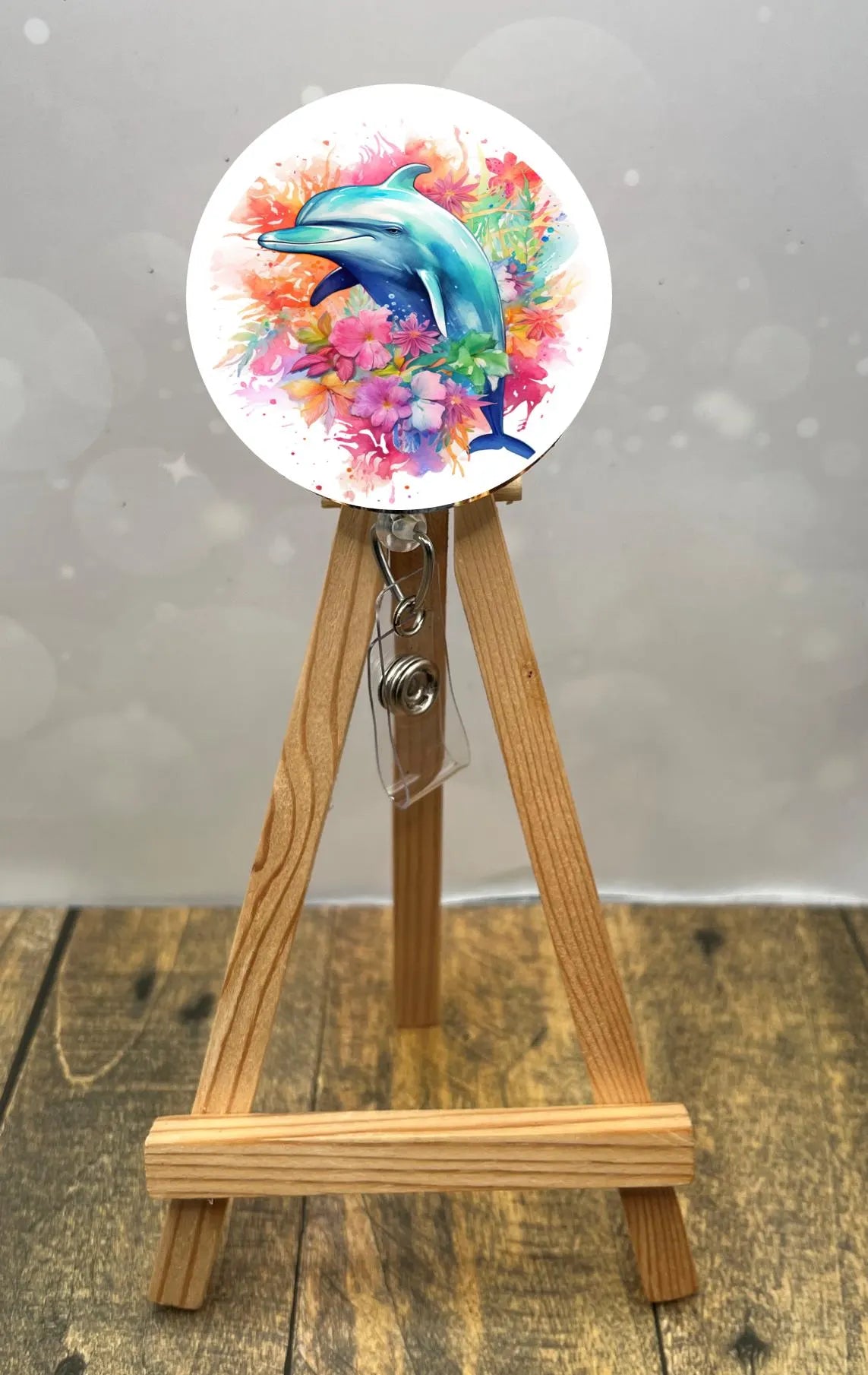 Dolphin badge pulls. Cute, coastal, and ready for every shift. Multiple Images available. Add beads or shimmer glitter options.