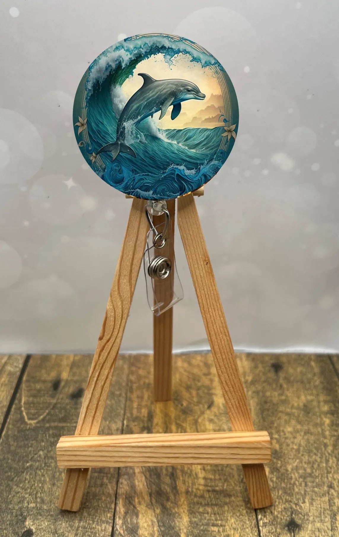 Dolphin badge pulls. Cute, coastal, and ready for every shift. Multiple Images available. Add beads or shimmer glitter options.