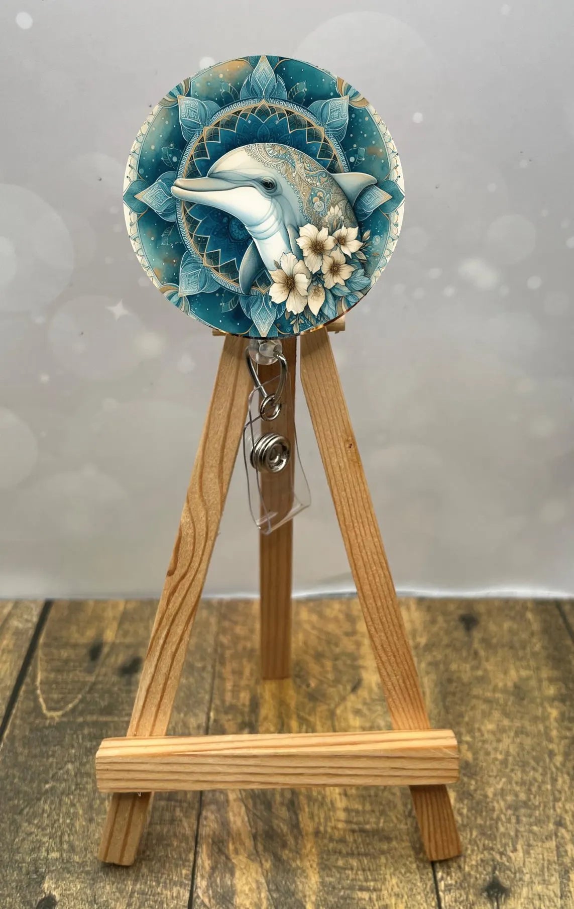 Dolphin badge pulls. Cute, coastal, and ready for every shift. Multiple Images available. Add beads or shimmer glitter options.